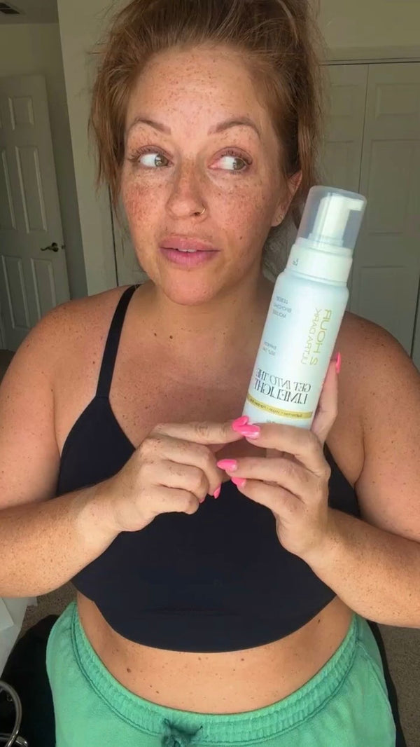 @thecallyjones holding Get Into The Limelight self tanning mousse