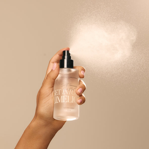 Spraying face tanning mist