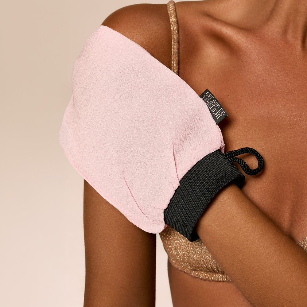Pink double-sided exfoliating mitt